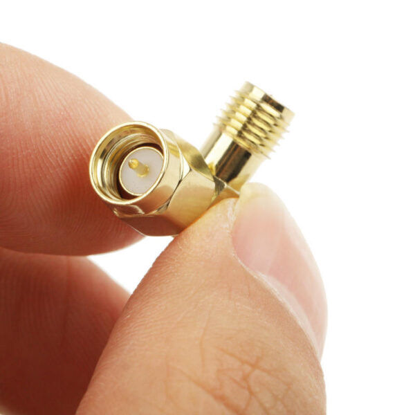 Adapter SMA Male naar RP-SMA Female kniestuk 90 - Afbeelding 3
